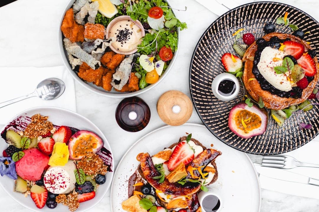A table of brunch dishes from above